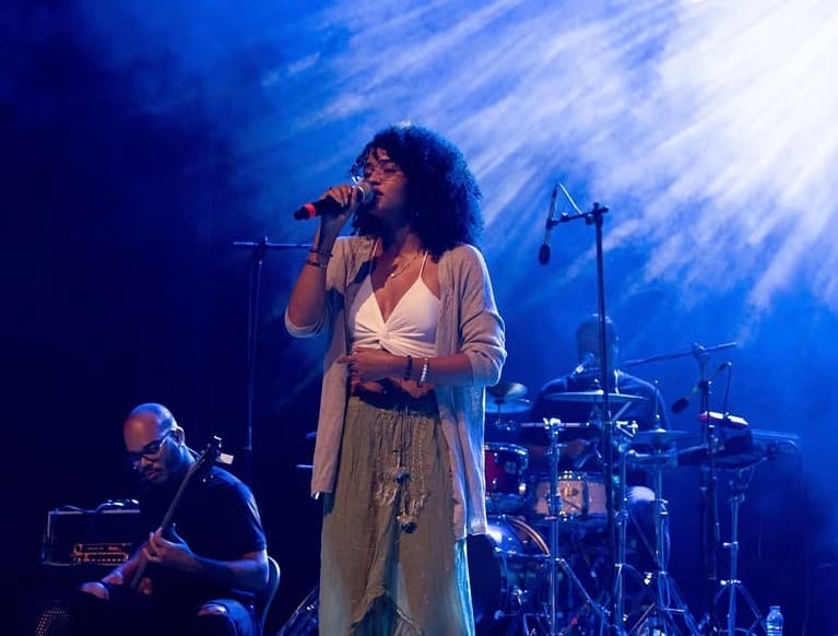 Lyssa performing on stage at the Atlantic Music Expo